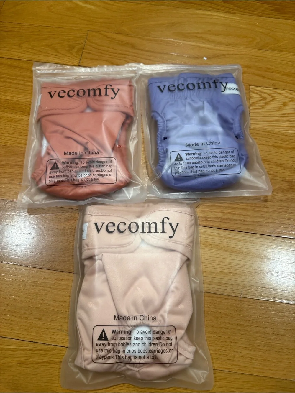 Vecomfy 3 female dogs reusable diapers size small.